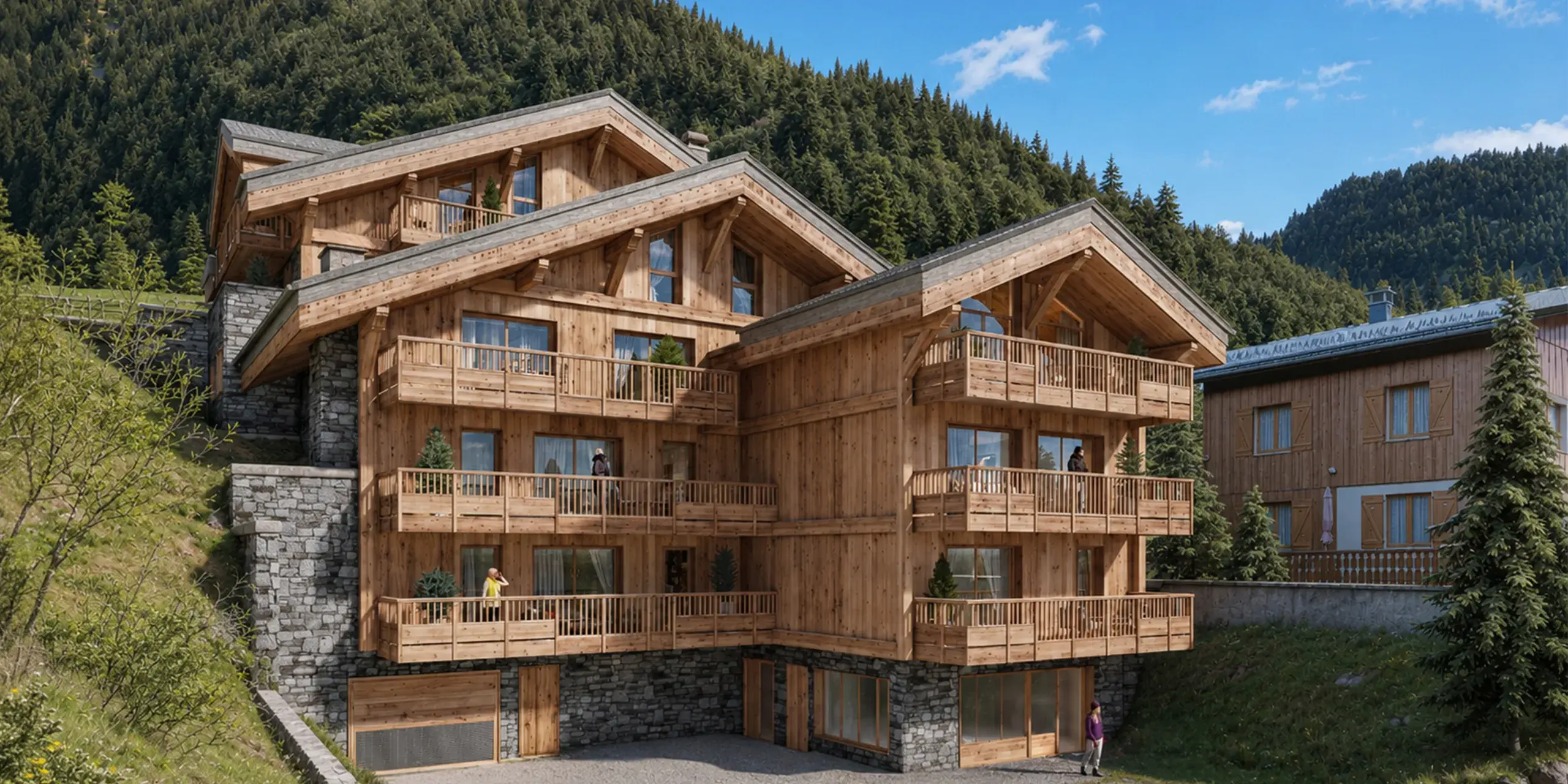 Perspective extérieure de la résidence Chalet Naya à Champagny-en-Vanoise en été