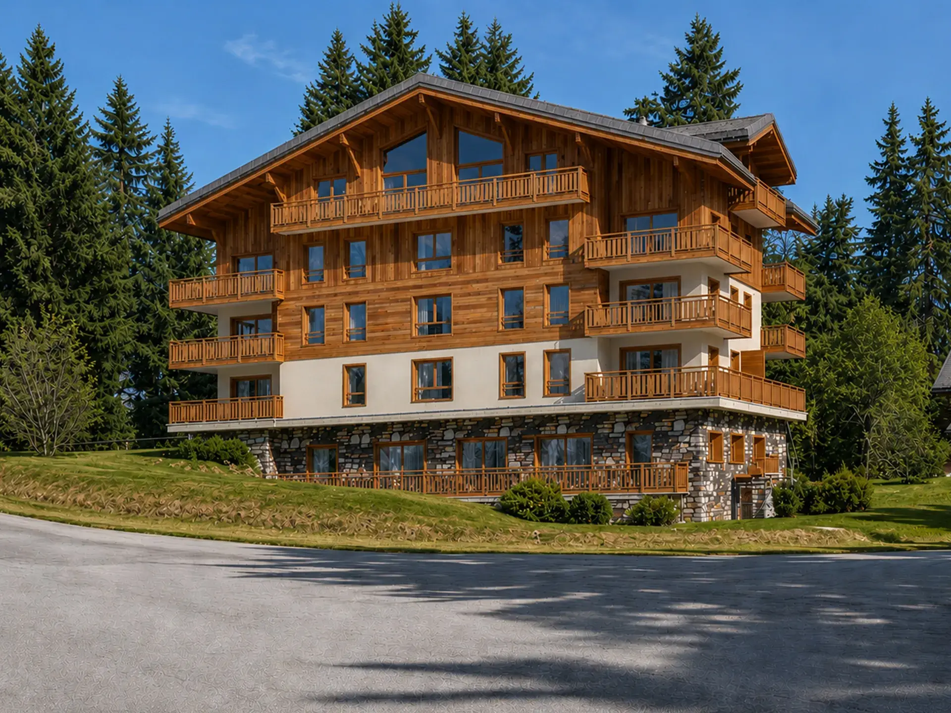 Vue extérieure du Chalet Caribou aux Saisies en été, résidence de prestige à la montagne